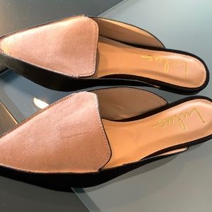 Tan and black mules